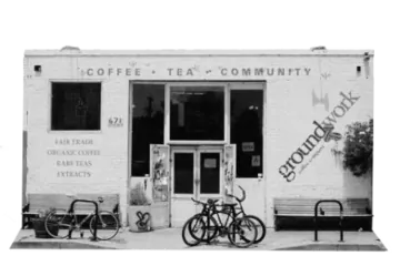 The Groundwork café on Rose Avenue in Venice in black and white, with benches and bicycles outside the shopfront