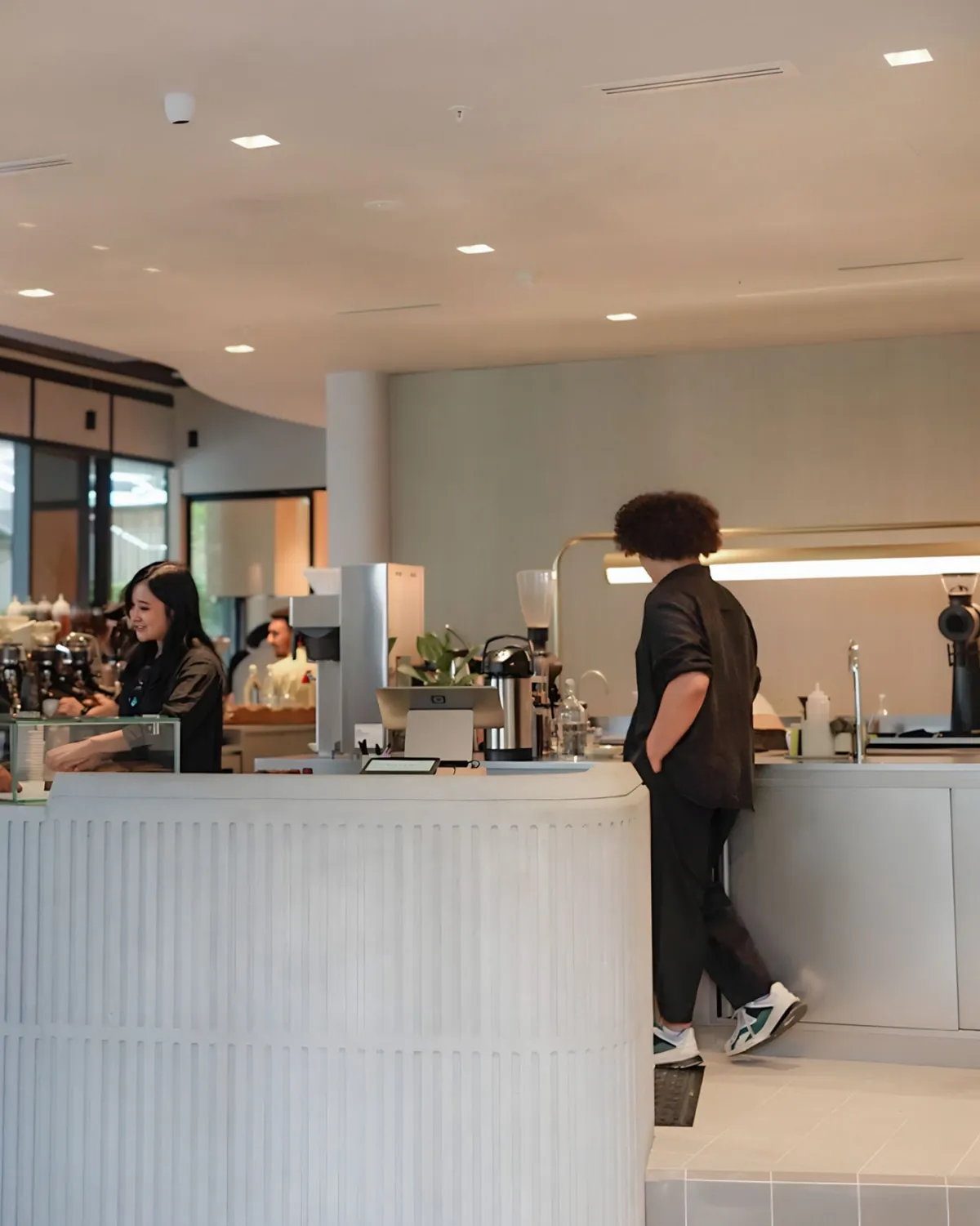 The fluted white counter and espresso bar at Haven Coffee's Green Square café in Zetland